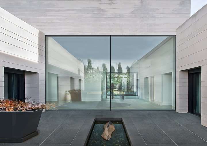 Cor Vision Plus glazing around a stone courtyard