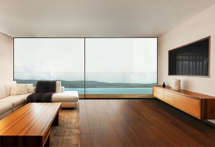 Cor Vision Plus sliding doors in a living room overlooking the water
